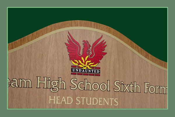 Close up view of Cheam High School logo produced with multiple layers of vinyl