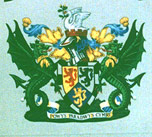 This coat of arms is handpainted and includes gold leaf, a rare thing to be seen on a road sign