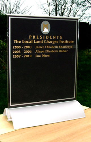 A portable honour board made with toughened glass in an aluminium base