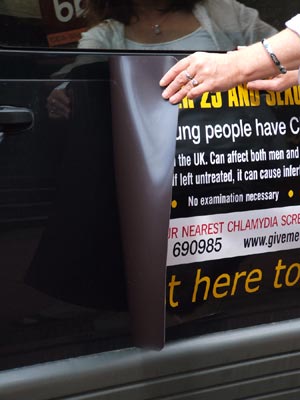 Magnetic sign being attached to this vehicle