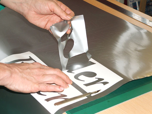 making self adhesive lettering for vans, cars and trucks
