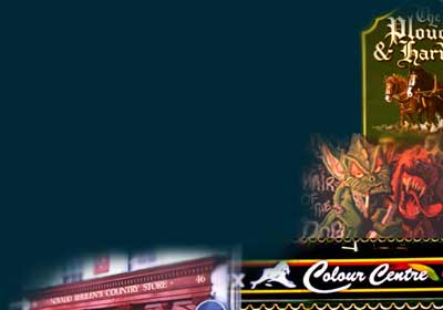 gold leaf pub signs, wild dog / alien mural, dulux colour centre and gilded shop fascia