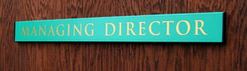 An easy to change office door nameplate sign