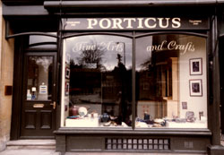 Shop front signs using transfer gold leaf on fascia and loose gold and oils on the window