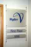 Polished stainless steel and clear acrylic used for this internal office sign