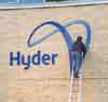 Company logo and lettering cut from aluminium, spray painted blue for Hyders head office