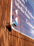 Polished stainless steel and clear acrylic used for this internal office sign