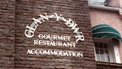 This shop front restaurant sign cut out Perspex. Please click on it for an enlargement