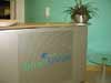 Interior office signs fixed in office reception area